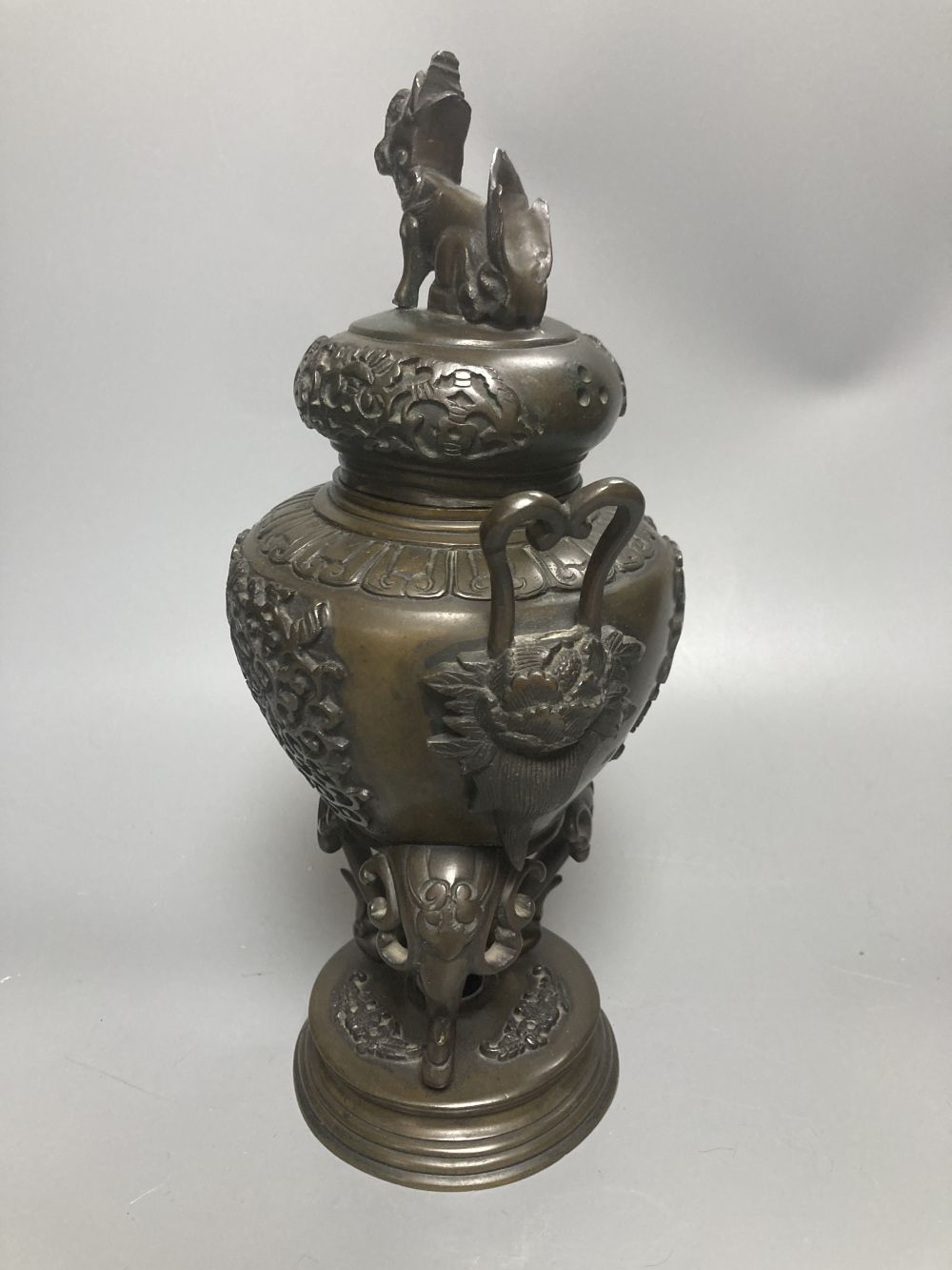 A Japanese ivory box and cover and a bronze koro and cover
